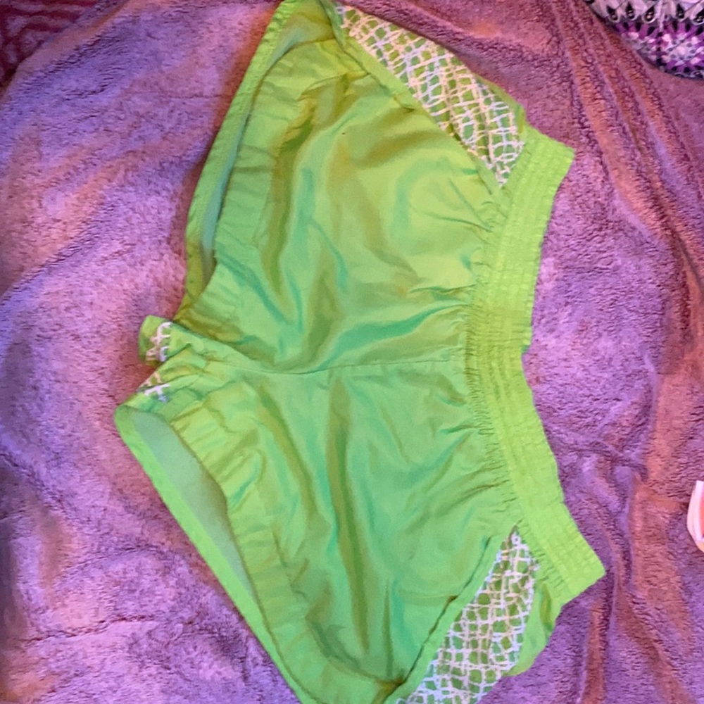 Green Nike shorts